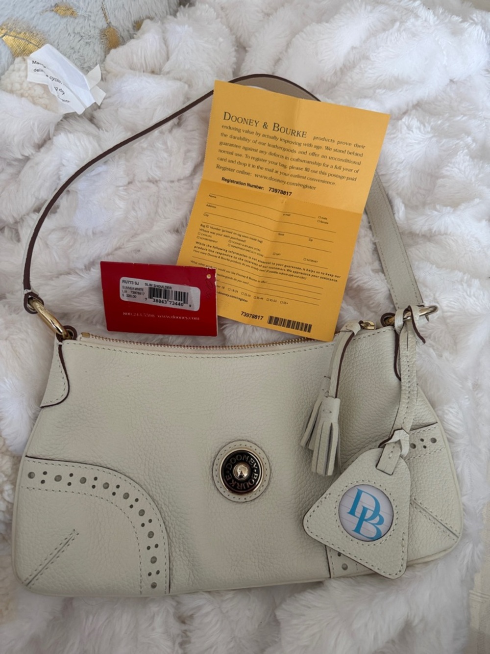 Dooney & Bourke Cream Pebble VINTAGE Leather Hobo Shoulder Bag with Tassel